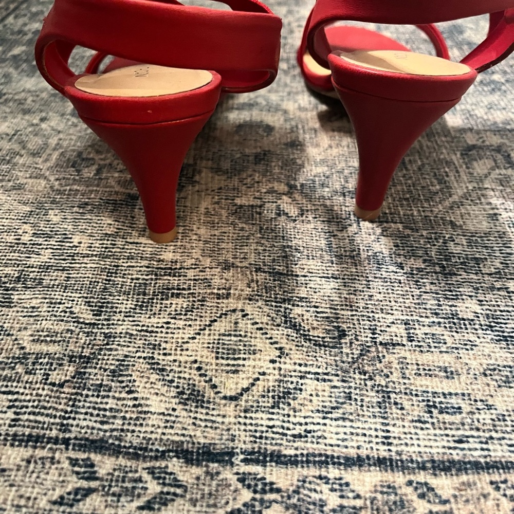 Red pumps never been worn